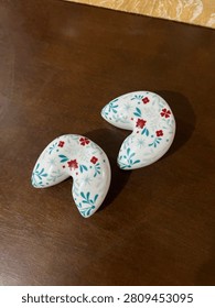 A pair of ceramic chopstick holders