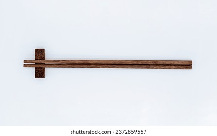 A pair of chopsticks on a white background - Powered by Shutterstock