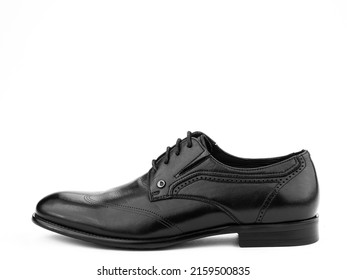 A pair of classic leather elegant men's shoes isolated white background. Groom's stylish black shoes. Isolated object close up on white background. Left side view.