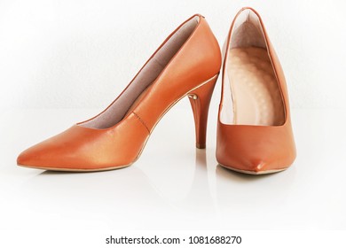 Pair Of Classic Women Brown Leather Heels. Fashion Footwear. Isolated. White Background.