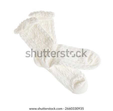 Pair of comfortable socks isolated on white, top view
