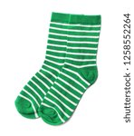 Pair of cute child socks on white background, top view