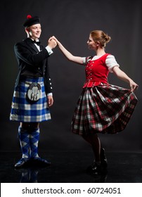 The Pair Dancing The Scottish Dance In A Kilt