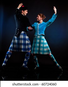 The Pair Dancing The Scottish Dance In A Kilt