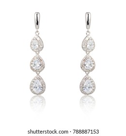 Pair Of Diamond Earrings Isolated On White Background