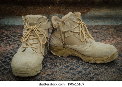 Pair Of Dirty Work Boots