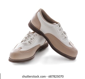 Pair Of Female Golf Shoes On White Background