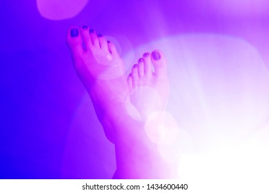 A pair the foot purple color background and halo  effect  The creative concept for leaflet other ideas