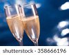 champagne glass blue background