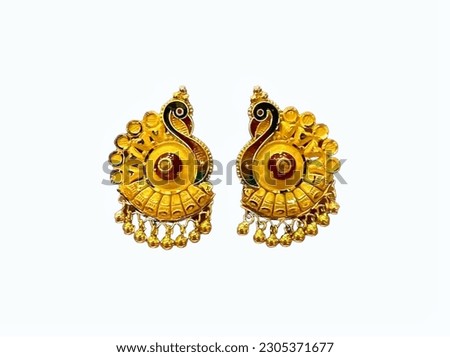 Pair of Gold ear tops (Gold earring) peacock design gold earrings tops isolated over white background. Clipping path