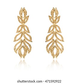 Pair Of Golden Diamond Earrings Isolated On White Background