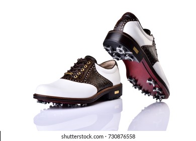 A Pair Of Golf Shoes With Isolated Background.