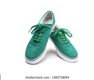 A Pair Of Green Canvas Shoes Isolated On White Background With Clipping Path