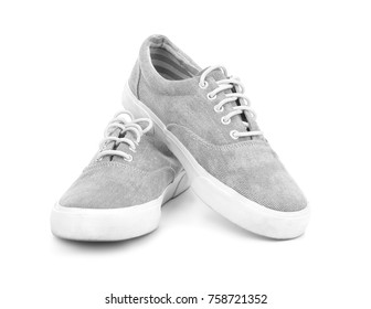 Pair Of Grey Tennis Shoes, Isolated On White
