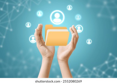 A pair of hands holding a yellow folder with surrounding network icons, symbolizing data management and digital connectivity. - Powered by Shutterstock