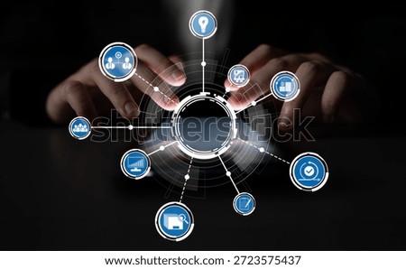 A pair of hands typing on a device, highlighted by technology icons representing connectivity and digital communication in a stylish, modern setup. Crux