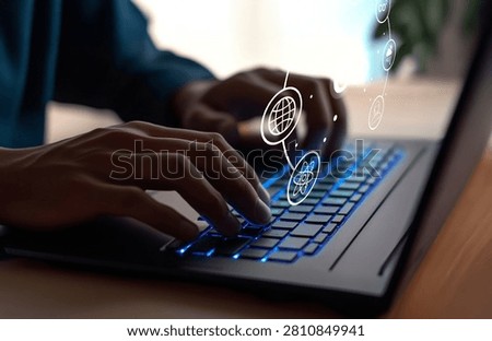 A pair of hands typing on a sleek laptop, complemented by a digital interface that signifies data connections and modern technology in a professional workspace.
