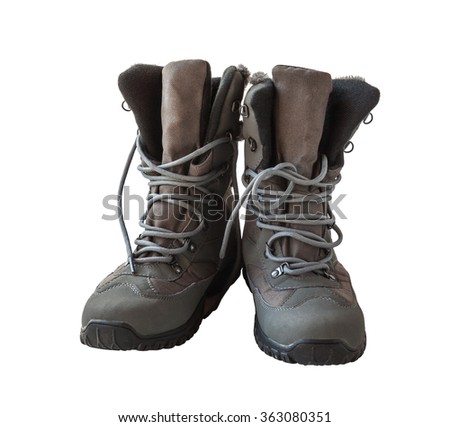 Pair of high warm gray boots on a white background