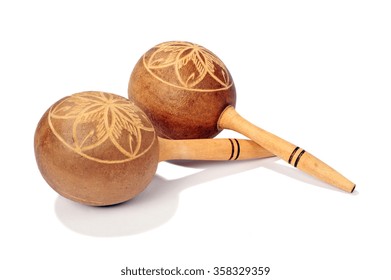 Pair of maracas isolated over white background