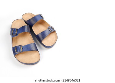 A Pair Of Men's Blue Leather Sandals Highlighted On A White Background.Summer Men's Shoes. Flat Orthopedic Slippers Of A Doctor Or Nurse.Shop Of Workwear, Uniforms.Copyspace