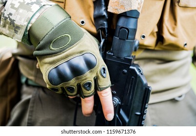 Pair of military fingerless gloves. 