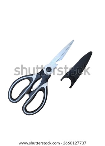 a pair of multifunctional kitchen scissors with a protective black sheath placed next to them