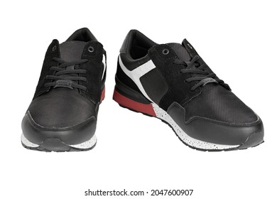 Pair Of New Non-branded Black Athletic Trainers Or Trainers Isolated On White Background. File Contains Clipping Path. Full Depth Of Field. Insulated Footwear.