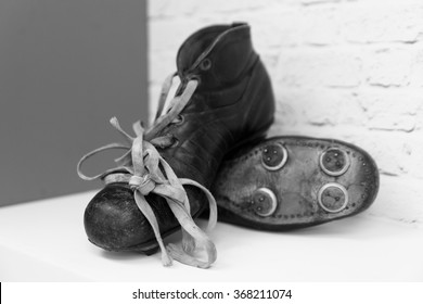 A Pair Of Old Football Boots.