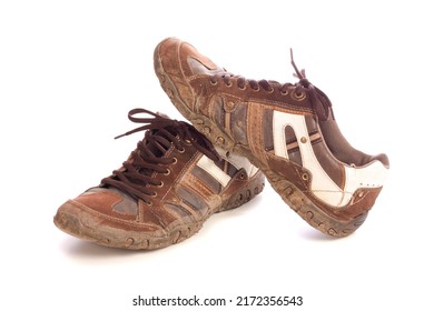 Pair Of Old Sneakers Isolated Over White Background