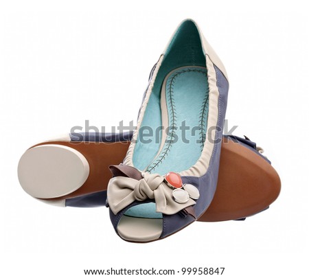Pair of open-toe summer shoes against white background