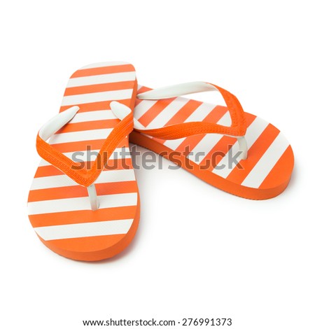 Pair of orange striped sandal on white background