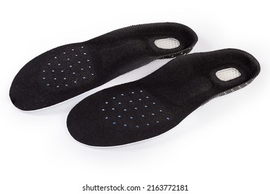 Pair Of The Orthopedic Shoe Inserts Of Universal Size On A White Background
