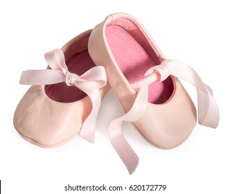 Pair Of Pink Ballet Shoes With Bowknot For Newborn Baby. Isolated On A White Background Close Up.