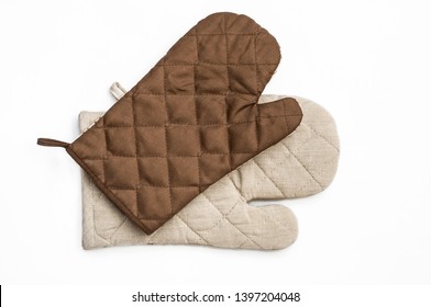 A pair of protective gloves on a white background. Kitchen mittens. Top view