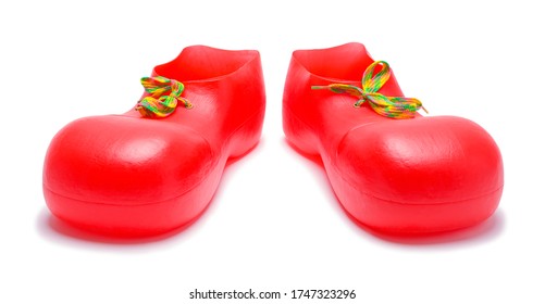 Pair Of Red Clown Shoes Isolated On White.