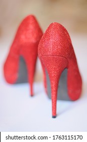  Pair Of Red Glittery High Heeel Shoes