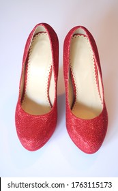  Pair Of Red Glittery High Heeel Shoes