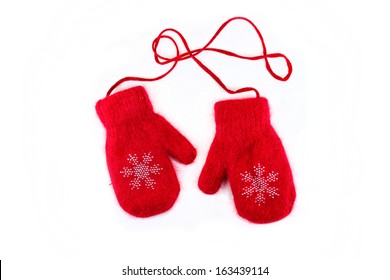 pair of red mittens. Isolate on white. 