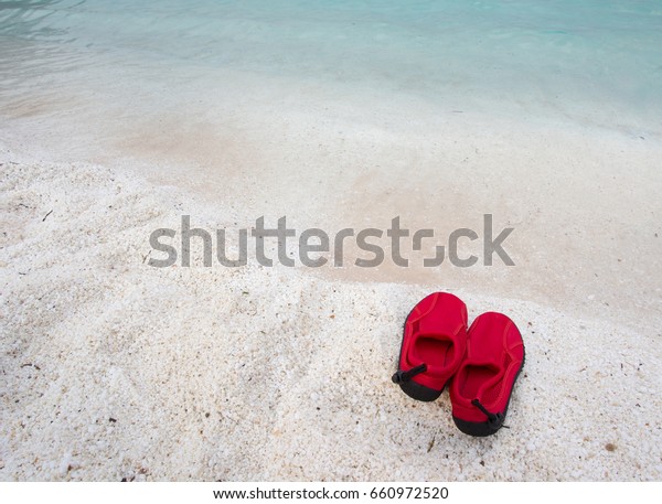 red swimming shoes