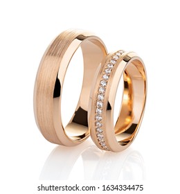 Pair Of Rose Gold Wedding Rings With Diamonds And Matte Surface Isolated On White. Golden Wedding Ring Bands