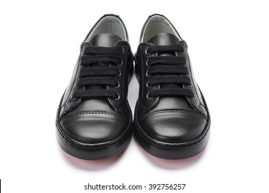 Pair Of  School Shoes For Boys, Shot At A 3/4 Angle On A White Background.