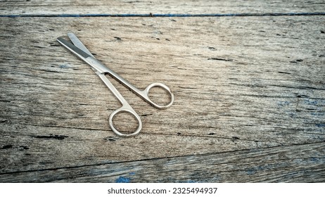 a pair of scissors on a board