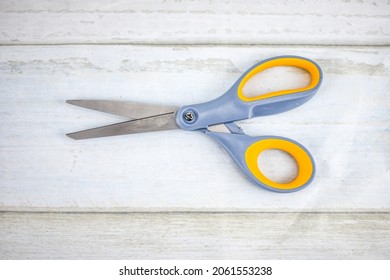A Pair of Scissors on White Background