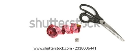 A pair of scissors,measuring tape and thimble isolated on a white background. Free space for text. Wide photo. Collage.