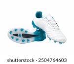 A pair of sleek white and teal soccer cleats designed for enhanced traction and performance on the field, highlighting modern athletic footwear innovation.