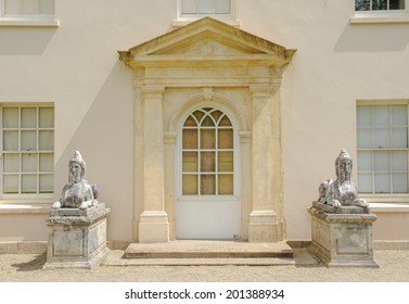 A pair of Sphinxes either side of a door at Saltram, Plympton, near Plymouth, Devon, England, UK