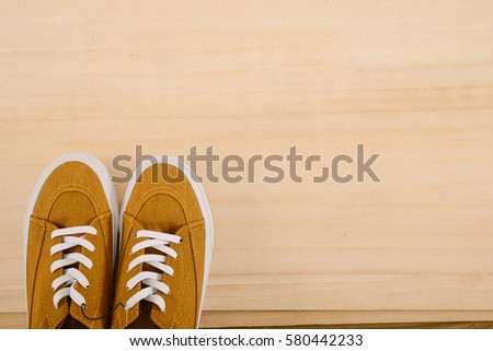 Pair of sport shoes on wooden background, Sport accessories and fashion, Healthy lifestyle