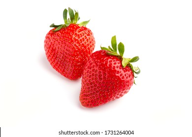 A pair of strawberries on white isolated background. - Shutterstock ID 1731264004