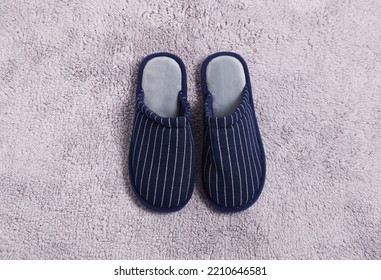 Pair Of Stylish Slippers On Light Grey Carpet, Top View