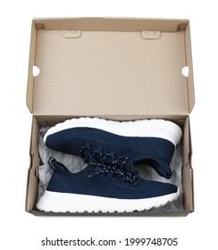 Pair Of Stylish Sport Shoes In Cardboard Box On White Background, Top View